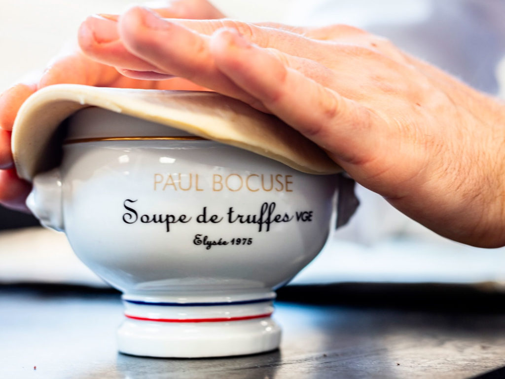 Eating at Paul Bocuse, one of the best restaurant in Lyon